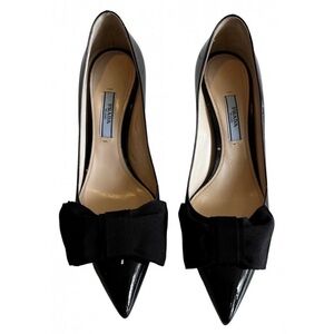 Prada black patent leather bow pumps